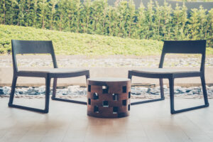 Outdoor deck with modern chair and table - Vintage filter