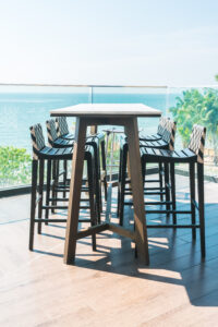 Black Outdoor deck with modern chair and table