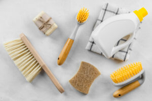 Top view of cleaning brushes and products to clean BDSM furniture